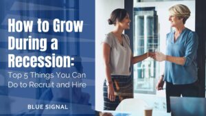 The text "How to Grow During A Recession: Top 5 Things You Can Do to Recruit and Hire" overlayed on an image of 2 women shaking hands in an office setting.