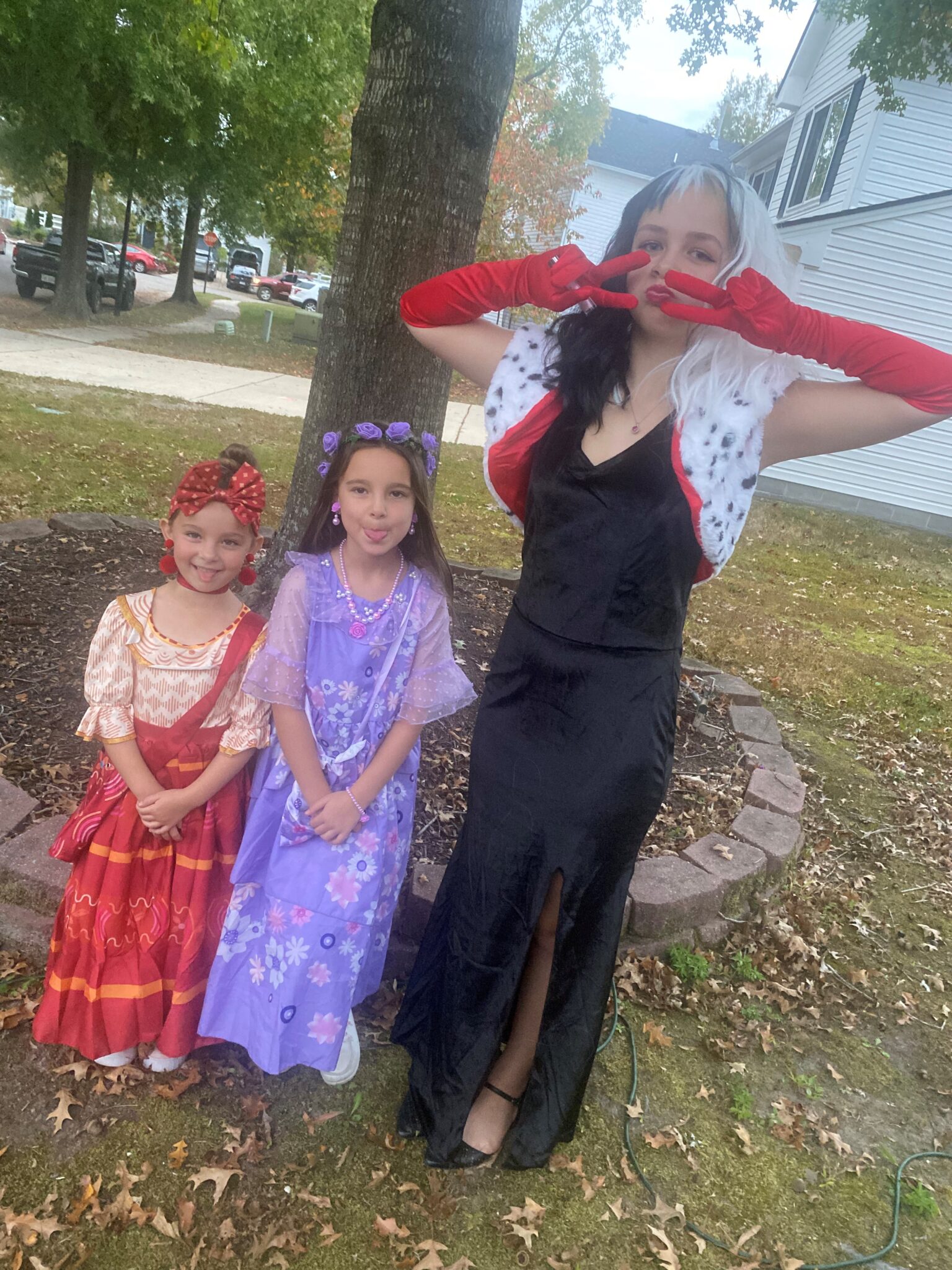 3 kids dressed up for halloween