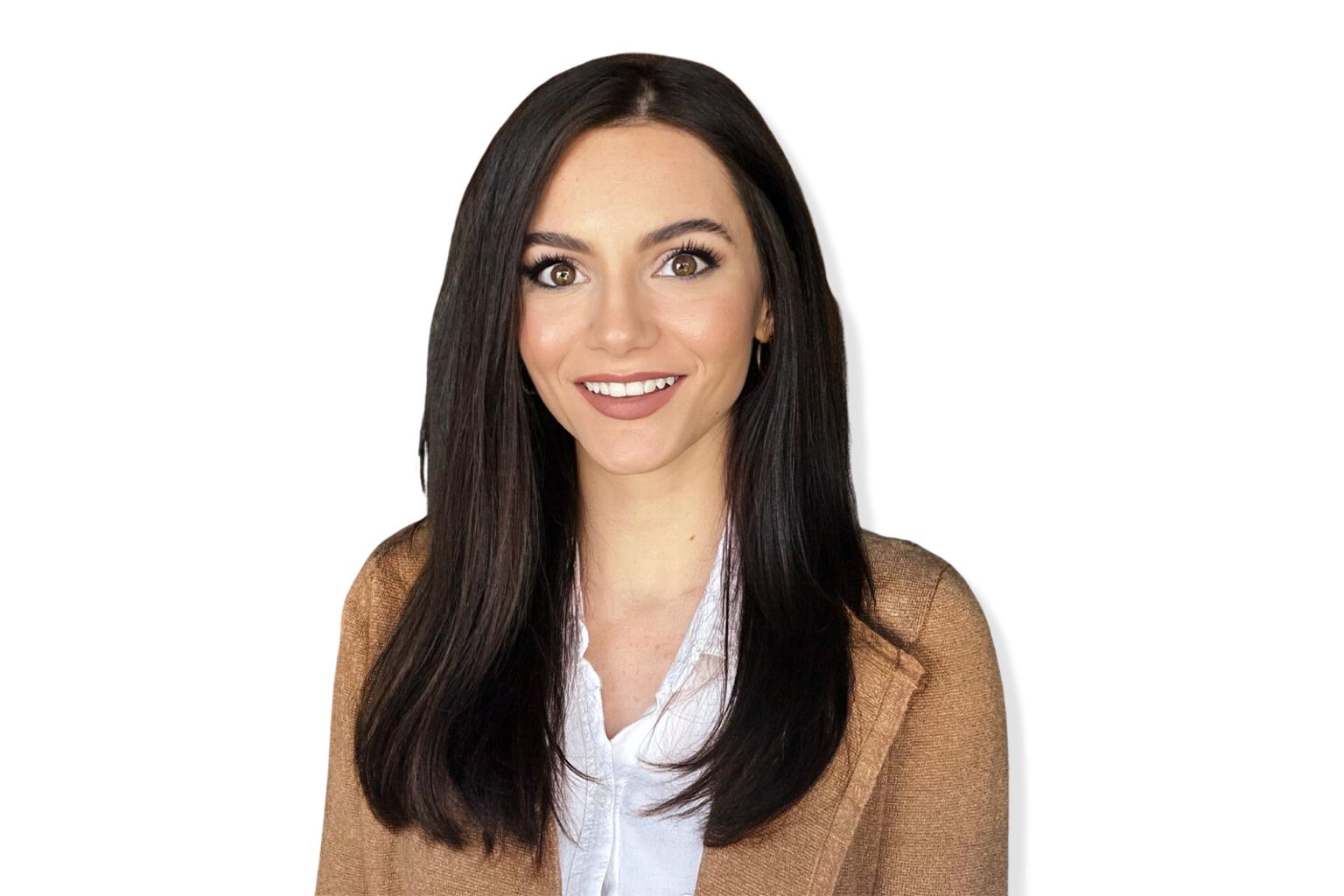 Professional headshot of Senior Marketing Specialist Taylor Leonard with a white background.