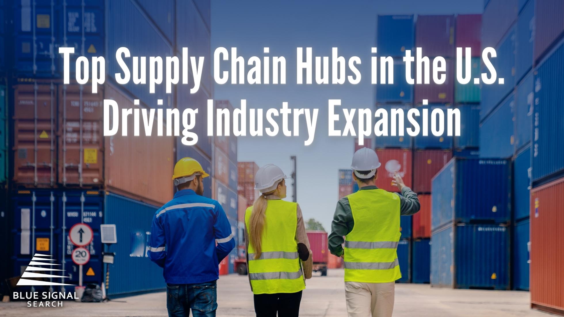 Three workers in high-visibility vests and hard hats walk through a shipping yard with stacked cargo containers.