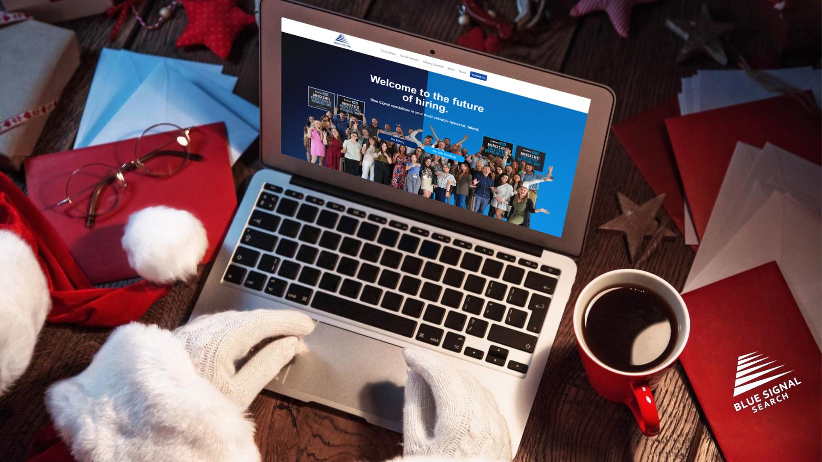 Holiday-themed workspace with a laptop, coffee mug, and festive decor, representing holiday stress management in a professional setting.