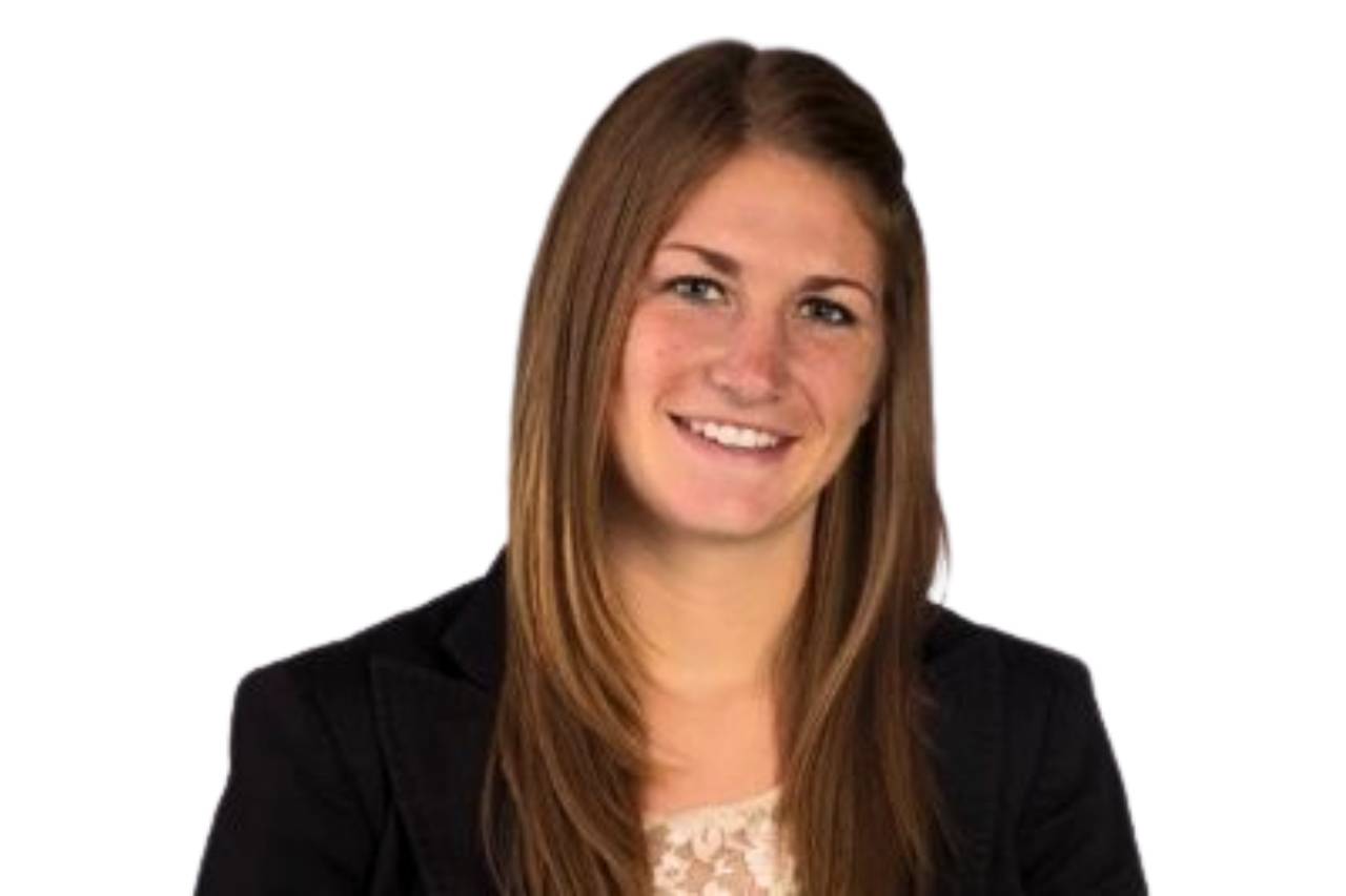 Professional headshot of Megan Walsh, Executive Recruiter at Blue Signal Search, smiling and wearing a black blazer over a lace top.