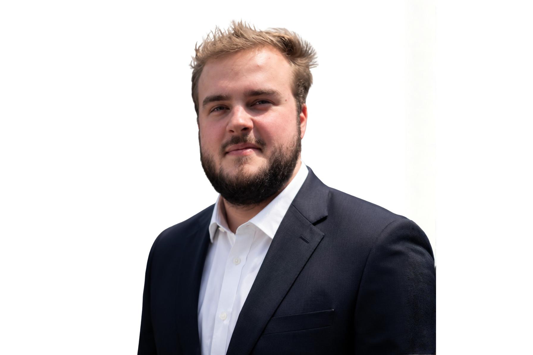 Professional headshot of Tyler Martin, recruiter at Blue Signal Search