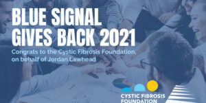 Photo of a team putting their hands together in a circle with a blue tint, text graphic reading Blue Signal Gives Back 2021 Congrats to the Cystic Fibrosis Foundation on Behalf of Jordan Lawhead